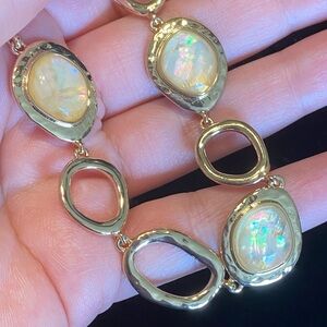 Elegant Gold Tone Necklace with Opalescent Stones